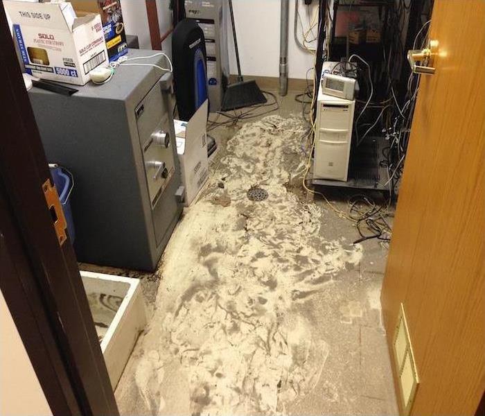 Dirty floor, mud in office building, flood damage to office